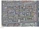 An aerial view shows the layout of the townhomes and common amenities like the Bella Vita Pool and surrounding streets at 5383 Indian River Dr # 327, Las Vegas, NV 89103