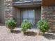 Private outdoor patio with stone accents and wrought iron railing at 5383 Indian River Dr # 327, Las Vegas, NV 89103