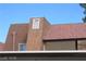 Exterior shot of condo building showcasing unit numbers and roof style at 5383 Indian River Dr # 327, Las Vegas, NV 89103