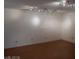 Unfurnished room with track lighting and hardwood flooring at 5383 Indian River Dr # 327, Las Vegas, NV 89103