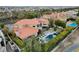 Aerial shot showcasing a private backyard with a pool, cabana, and manicured landscaping at 60 Innisbrook Ave, Las Vegas, NV 89113