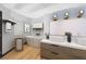 Bright bathroom featuring dual vanities, modern fixtures and a soaking tub at 60 Innisbrook Ave, Las Vegas, NV 89113