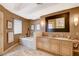 Bathroom with a large soaking tub, marble countertop and neutral color palette at 60 Innisbrook Ave, Las Vegas, NV 89113
