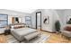 Modern bedroom features sleek gray walls, hardwood floors and stylish furnishings at 60 Innisbrook Ave, Las Vegas, NV 89113