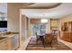 Cozy dining area with table, chairs, and view to the outside at 60 Innisbrook Ave, Las Vegas, NV 89113