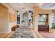 Elegant foyer with artwork, decorative rug, and a glimpse of the home's interior at 60 Innisbrook Ave, Las Vegas, NV 89113