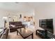 Open floor plan showcases the living room connected to the kitchen area at 605 Devonhall St # 201, Las Vegas, NV 89145