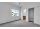 Bedroom featuring carpeted floors, a window, and a closet with sliding doors at 6325 Orions Tool St, North Las Vegas, NV 89031