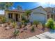 Charming single story home with drought resistant landscaping, and an attached two car garage at 669 Elliot Peak Ave, Las Vegas, NV 89183
