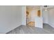 Living room featuring wood-look floors and an open view to the kitchen at 7151 S Durango Dr # 211, Las Vegas, NV 89113