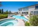 Beautiful backyard with pool, hot tub, lush landscaping, and outdoor seating area for relaxation and entertainment at 7538 Mustang St, Las Vegas, NV 89131