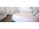 Bedroom featuring neutral walls, carpeted floors, a full-length mirror, closet, and a bed with throw blanket at 7538 Mustang St, Las Vegas, NV 89131