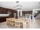 Bright kitchen boasts wood cabinets, stone countertops, stainless steel appliances, and a large center island at 7538 Mustang St, Las Vegas, NV 89131