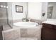 The main bathroom features a large soaking tub and separate shower at 7538 Mustang St, Las Vegas, NV 89131