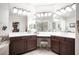Main bathroom with double sink vanity and separate shower and tub at 7538 Mustang St, Las Vegas, NV 89131