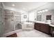 The main bathroom includes a large tile shower and separate soaking tub at 7538 Mustang St, Las Vegas, NV 89131