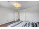 Neutral bedroom features soft carpet, natural light, and easy access to adjacent rooms at 7756 Seville Estates Ct, Las Vegas, NV 89113