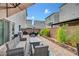 Inviting patio area with stylish furniture and lush landscaping at 7756 Seville Estates Ct, Las Vegas, NV 89113