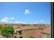 Neighborhood rooftops and desert scenery on a sunny day at 7756 Seville Estates Ct, Las Vegas, NV 89113