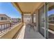 Charming balcony with seating, offering a view of the neighborhood at 7852 Running Doe Ct, Las Vegas, NV 89149