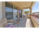 Relaxing balcony with outdoor furniture, perfect for enjoying the fresh air at 7852 Running Doe Ct, Las Vegas, NV 89149