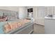 Comfortable bedroom with carpet, great natural light, closet, and a large bed at 7852 Running Doe Ct, Las Vegas, NV 89149
