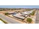Wide aerial view showcasing a home with a basketball court and modern design, nestled in a tranquil neighborhood at 7998 W Ford Ave, Las Vegas, NV 89113
