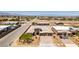 Beautiful home aerial shot featuring an expansive driveway, multiple garages, and well-maintained desert landscaping at 7998 W Ford Ave, Las Vegas, NV 89113