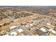 Panoramic aerial view of the residential neighborhood with modern homes, desert landscape, and city skyline in the distance at 7998 W Ford Ave, Las Vegas, NV 89113