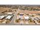 A high-angle shot reveals properties with swimming pools and thoughtful design in a desert environment at 7998 W Ford Ave, Las Vegas, NV 89113