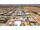 Aerial view capturing the property's location, large desert lots, and a community with many backyard pools at 7998 W Ford Ave, Las Vegas, NV 89113