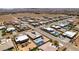Wide aerial view showing properties with private pools and basketball courts in a desert community near the mountains at 7998 W Ford Ave, Las Vegas, NV 89113