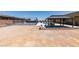 Large backyard with a basketball court and gazebo, perfect for outdoor activities at 7998 W Ford Ave, Las Vegas, NV 89113