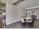Open concept dining room offering ample space and an elegant chandelier at 7998 W Ford Ave, Las Vegas, NV 89113