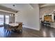 Modern dining area with stylish lighting and kitchen view at 7998 W Ford Ave, Las Vegas, NV 89113