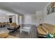Elegant living room flowing into dining area and kitchen at 7998 W Ford Ave, Las Vegas, NV 89113