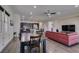 Spacious living room with hardwood floors, recessed lights, dining area and access to the kitchen at 7998 W Ford Ave, Las Vegas, NV 89113