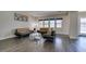 Bright living room with stylish furniture and access to the pool at 7998 W Ford Ave, Las Vegas, NV 89113