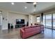 Spacious living room with ample light, hardwood floors, and backyard access at 7998 W Ford Ave, Las Vegas, NV 89113