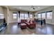 This open concept living space has a modern design with dining and living room areas at 7998 W Ford Ave, Las Vegas, NV 89113