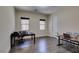 Office with dark floors and two desks at 7998 W Ford Ave, Las Vegas, NV 89113