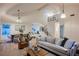 Bright living room with high ceilings, modern decor, and an open floor plan at 8104 Bay Harbor Dr, Las Vegas, NV 89128