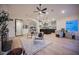 Open-concept living space with modern decor, fireplace and lots of natural light at 8104 Bay Harbor Dr, Las Vegas, NV 89128