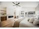 Bright main bedroom with fireplace, vaulted ceiling and access to outdoor pool area at 8104 Bay Harbor Dr, Las Vegas, NV 89128