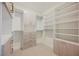Organized walk-in closet with custom shelving and ample storage space at 8104 Bay Harbor Dr, Las Vegas, NV 89128