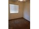 Neutral bedroom featuring a ceiling fan and natural light from the window at 8550 Bright Bush St, Las Vegas, NV 89131