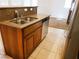 A kitchen with granite countertops, stainless steel appliances, and tile floors at 8550 Bright Bush St, Las Vegas, NV 89131