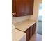 Laundry room featuring tile flooring, countertops, overhead cabinets and appliances at 8550 Bright Bush St, Las Vegas, NV 89131