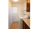 Laundry room featuring tile flooring, a washer, a dryer, and built-in cabinets at 8550 Bright Bush St, Las Vegas, NV 89131