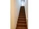 A carpeted staircase with a white railing leading to the second floor at 8550 Bright Bush St, Las Vegas, NV 89131